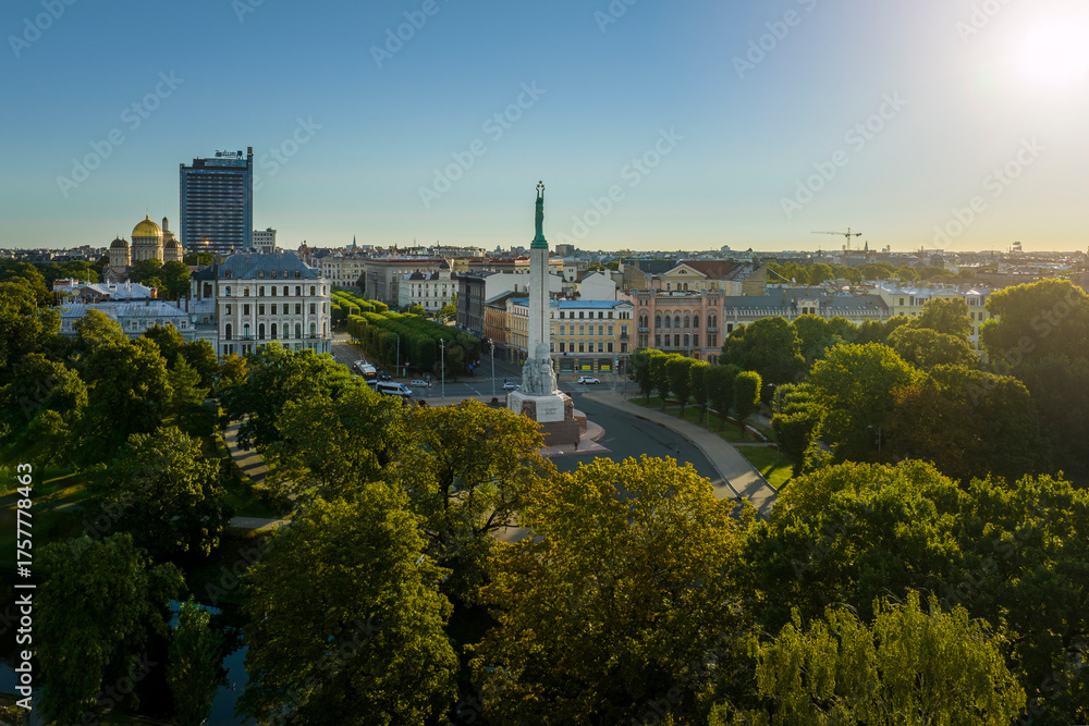 Fototapeta premium Birds eye view of the old city of Riga and statue of liberty - Milda.