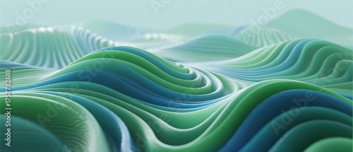 Abstract wave-like patterns in soft green and blue tones, creating a smooth and artistic visual effect.