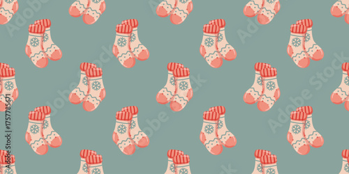 Seamless pattern with cartoon winter socks on teal background. Winter Vector holiday cozy background. 