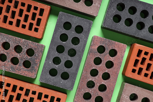 Different bricks on green b...