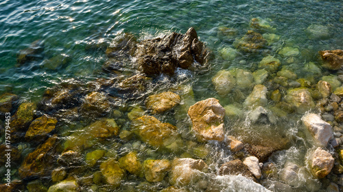 A view of the beautiful sea coast full of large stones