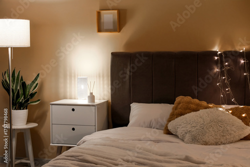 Soft bed, bedside table and...