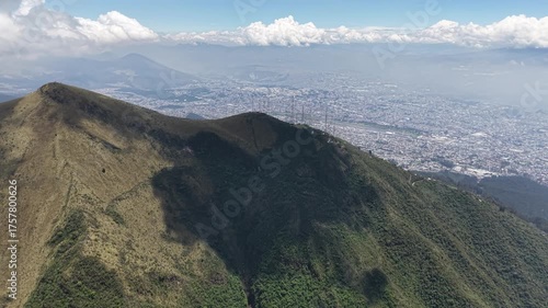 Breathtaking aerial footage showcasing the iconic Rucu Pichincha volcano and the TeleferiQo viewpoint high above Quito, Ecuador
