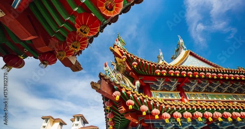 Kuala Lumpur, Malaysia – October 13, 2025: Time lapse of Thean Hou Temple courtyard decorated with hundreds of lanterns, visitors walking and clouds moving above
