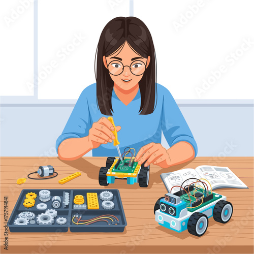 Young woman assembling robot car kit