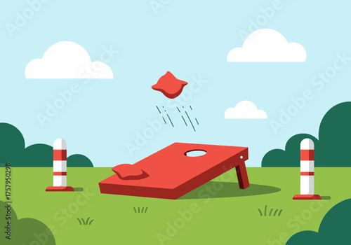 Outdoor cornhole game with red beanbag in mid-air.