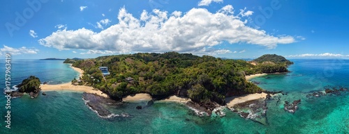 Aerial 180° panorama of Sakatia Island, Nosy Be, Madagascar – turquoise sea, white sand beach, palm trees, and tropical paradise in the Indian Ocean.