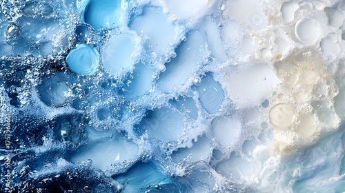 Abstract water texture with bubbles and splashes in shades of blue and white