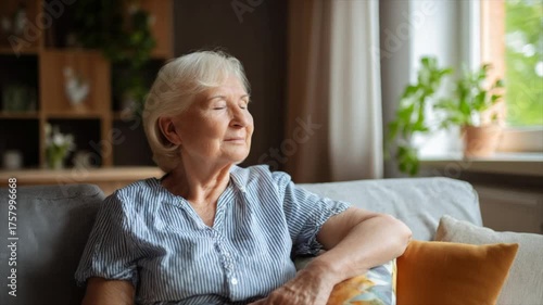 Peaceful elderly woman enjoying a moment of relaxation