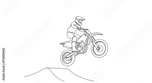 Motocross Rider Soaring Through the Air on a Dirt Bike.
