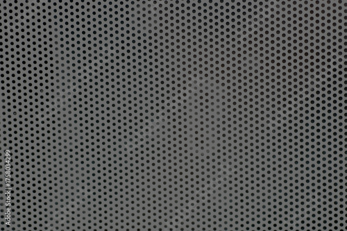 A seamless dark metal mesh texture with a carbon fiber pattern for an industrial design wallpaper or background