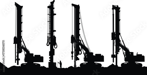Heavy construction pile drivers silhouetted on uneven terrain, four drilling rigs with hydraulic masts, worker for scale, industrial excavation scene