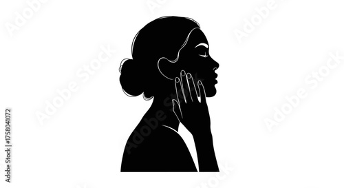 Elegant profile silhouette of a woman touching her face with her hand