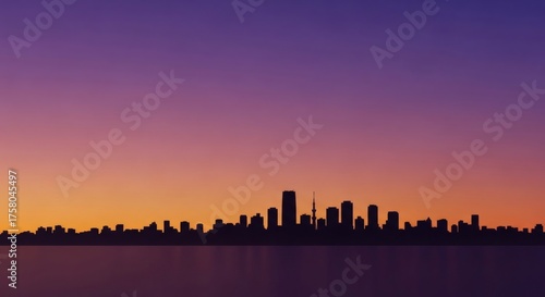 Atmospheric panorama of a metropolitan skyline silhouetted against a magnificent sunset sky with a smooth gradient of purple and orange