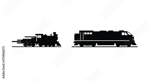 A silhouette of an old steam train and a modern diesel locomotive