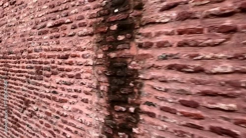 The brick wall on the side of the walkway leading inside Agra Fort (Qila Agra), Agra, Uttar Pradesh, India | UNESCO World Heritage Site