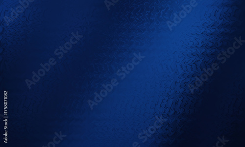 Deep blue textured fabric with subtle light reflections and shadows creating a luxurious feel