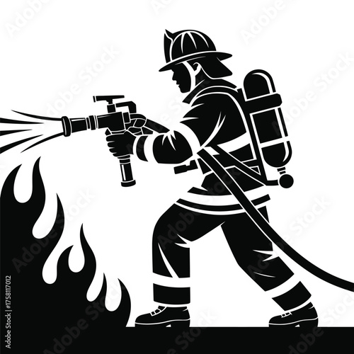 Firefighter in silhouette dousing flames with water spray