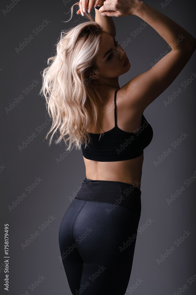 Naklejka premium Woman Posing in Athletic Wear