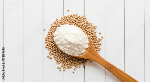 Wooden Spoon with Flour and Mustard Seeds on White Wood.