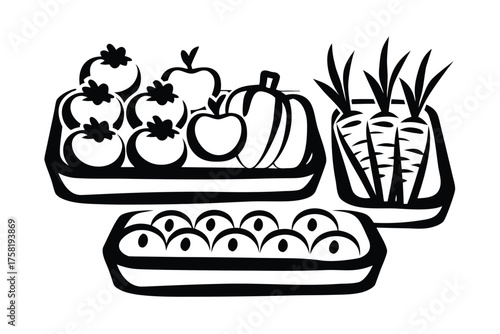 Black and white fruits and vegetables are placed neatly in trays forming a still life