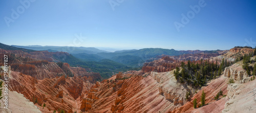 Cedar Breaks National Monument in Utah. A natural amphitheater filled with hoodoos, windows, canyons, spires, walls, and steep cliffs. A veiw from the canyon rim.