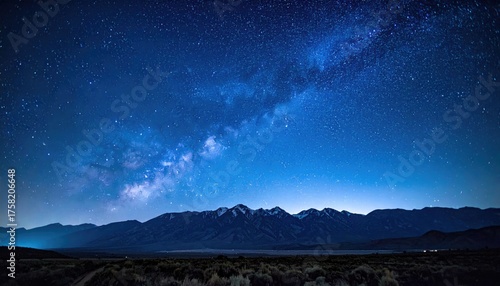 Bild auf Leinwand Vast Starry Night Sky Over Jagged Mountains Under a Celestial Milky Way Galaxy W