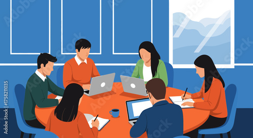 Business team meeting with laptops in modern office setting