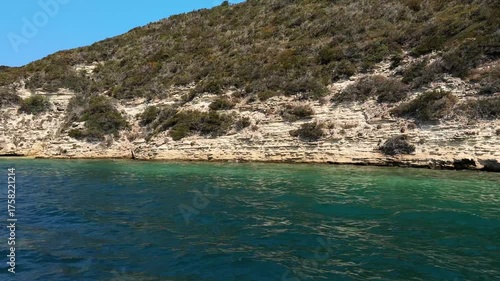 Rocky cliffs seen from the sea. Coastal cliffs. Corsica