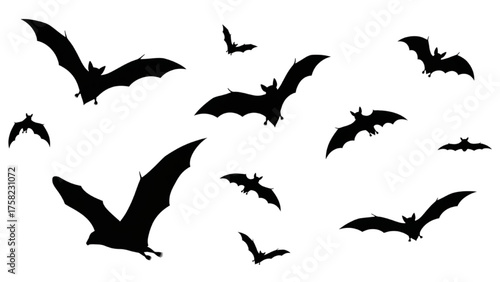 Dynamic Silhouetted Bat Collection in Various Flight Poses for Spooky Themed Designs and Nocturnal Wildlife Graphics