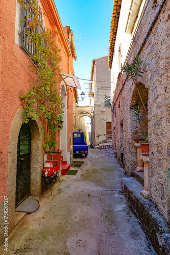 A narrow street among the old houses of Atena Lucana, a village in the province of Salerno, Italy.