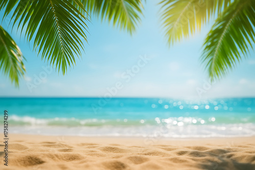 Fototapeta Naklejka Na Ścianę i Meble -  Tropical beach paradise with palm leaves and ocean waves