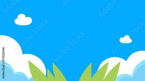 Bright blue sky with fluffy clouds and green grass blades