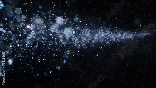 A stellar formation of lights drifts through the vast, dark cosmos