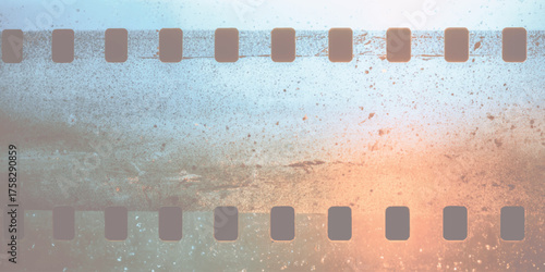 Aged film strip with speckled texture and gradient vintage