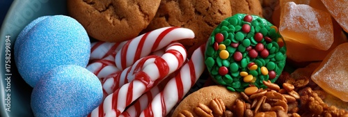 Colorful holiday treats with candy canes, cookies, and sweets