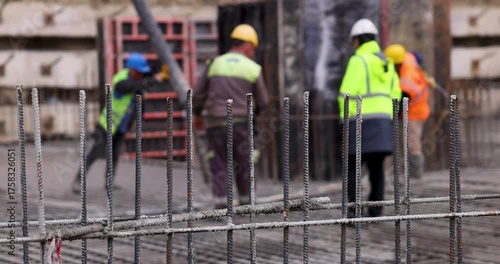 Concrete Pouring at a Construction Site | Workers Behind Rebar in 4K Slow Motion