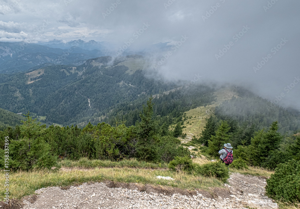 Obraz premium On hike from Gemeindealpe 1626 m summit down to Erlaufsee lake at 827 m, Lower Austria Limestone Alps in Mitterbach am Erlaufsee municipality, Styria, Austria