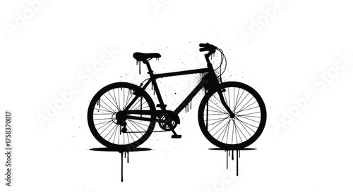 An abstract black silhouette of a mountain bike with a splatter paint effect over a white background.