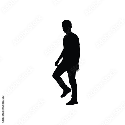 Silhouette of a man in a t shirt and jeans stepping forward against a white background space