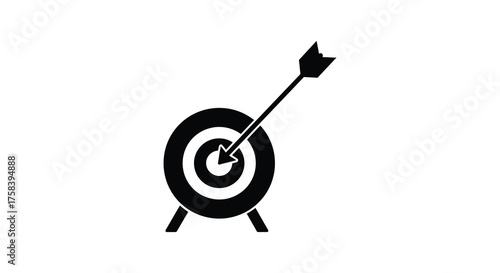Black silhouette of a dartboard with an arrow hitting the bullseye on a white background silhouette