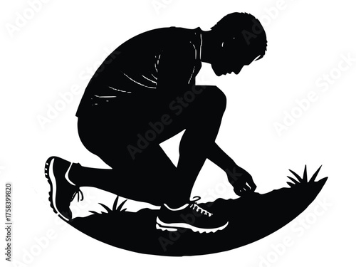 Vector art of silhouette of a man tying his shoelace for design
