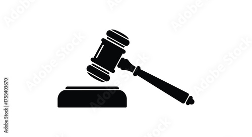 A stark black silhouette of a judge s gavel poised above a sounding block representing justice and law silhouette