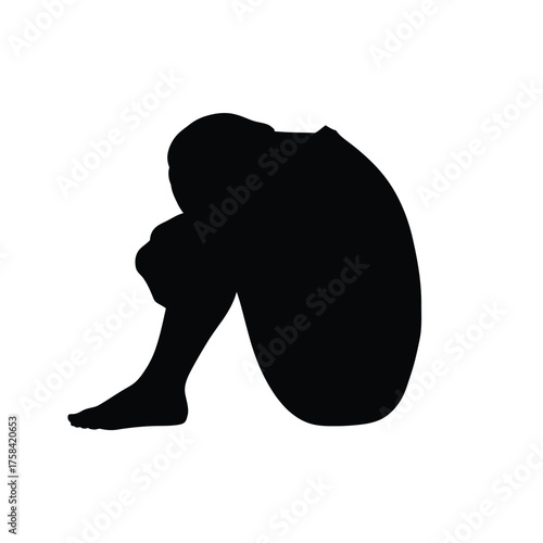 Silhouette of a person curled up with knees to chest on a white background isolation
