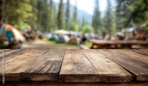 Wooden Tabletop in Focus with Blurry Camping Scene in Background