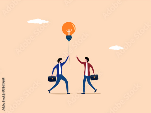 Businessman gives knowledge light bulb to coworker