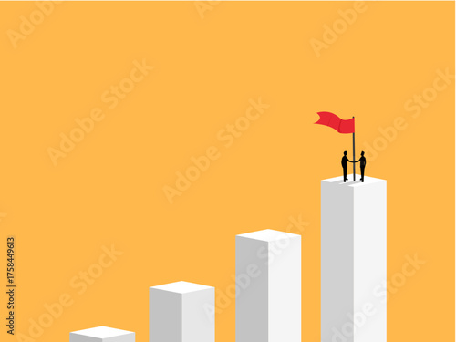 Two businessmen on a bar graph holding a flag of success together