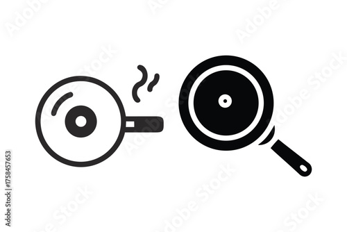 Two black frying pans with differing designs one with an egg