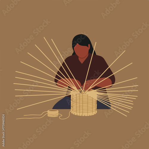 Person weaving a basket with radial strands and spool