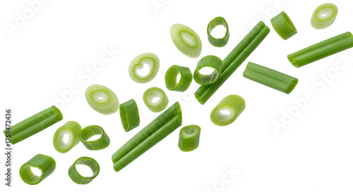 Isolated Green Onion Slices fresh scallions, chopped chives, alliums on a plain surface